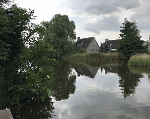 Serene waterkant bij Stolp bungalow in Medemblik, IJsselmeerkust