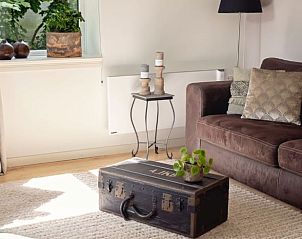 Gezellige woonkamer in Huisje in Andijk, vakantiehuis aan de IJsselmeerkust in Noord-Holland.