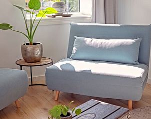 Comfortabele zithoek in Huisje in Andijk, vakantiehuis aan de IJsselmeerkust in Noord-Holland.