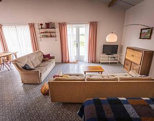 Open leefruimte in Vakantiehuis in Hem, Noord-Holland met uitzicht op het platteland.
