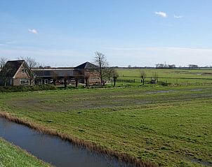 Landelijke ligging van Vakantiehuisje in Schagen, omringd door weilanden in Noord-Holland noord.