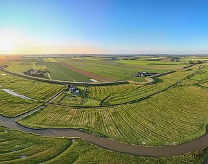 Uitgestrekt landschap rond Vakantiehuisje in Schagen in Noord-Holland noord, gezien vanuit de lucht.