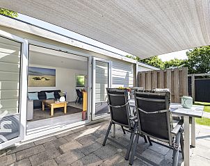 Gezellige binnenruimte van NH392 vakantiehuis in Schoorl, Noord-Holland.