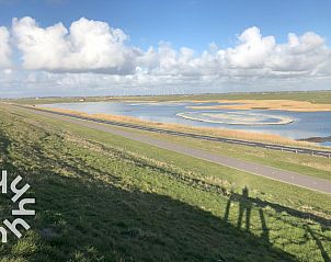 Zitplek in de tuin van NH392 vakantiehuis in Schoorl, Noord-Holland.