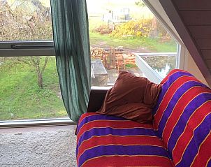 Huisje in Schoorl verlicht bij nacht, vakantiehuis in Noord-Holland noord.