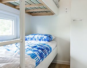 Modern bathroom in Ferox XL 6-person vacation home in Berkhout, North Holland, with sleek shower and stylish sink.