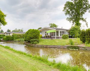 Country house for 4 people in Berkhout, North Holland offers an idyllic vacation home with a terrace and views of the water and nature.