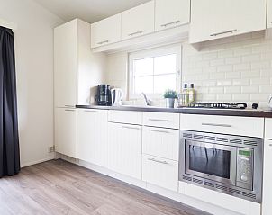 Modern kitchen in Country House for 4 people, vacation home in Berkhout, North Holland, with light interior and fully equipped appliances.