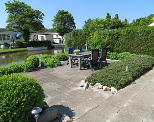 Verblijf 490326 - Vakantiewoning IJsselmeerkust - huisje 143, bootje, aan het water, grote tuin en terrassen