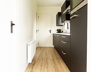 Modern kitchen from Module Special 4 persons Wellness in Berkhout, North Holland, vacation home with stylish interior and luxury amenities.