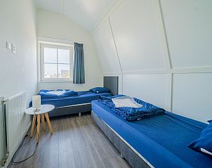 Tweepersoonskamer in Chalet in Uitdam, Amsterdam eo, met comfortabele bedden.