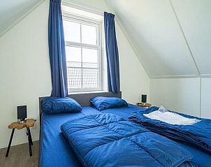 Knusse zolderkamer in Vakantiehuis Munt 6, Uitdam, perfect voor een goede nachtrust in Amsterdam eo, Noord-Holland.