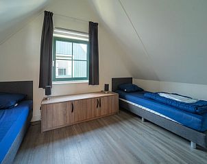 Gezellige kinderkamer met twee bedden in Appartement Zuiderzee 10, Uitdam, Amsterdam.