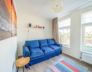 Knusse zithoek in Vakantiehuis Munt 4, Uitdam, Amsterdam eo, Noord-Holland voor ontspannen avonden.