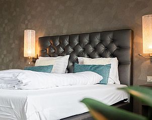 Comfort Room 4 in Uitdam biedt een luxe slaapkamerervaring met een stijlvol interieur, gelegen nabij Amsterdam in Noord-Holland.