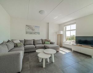 Gezellige woonkamer in Vakantiehuis Westertoren 12, Uitdam, Amsterdam eo, Noord-Holland, ideaal voor ontspanning.