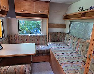 Gezellige zithoek in Huisje in Broek in Waterland, vakantiehuis in Broek in Waterland, Amsterdam eo, Noord-Holland.