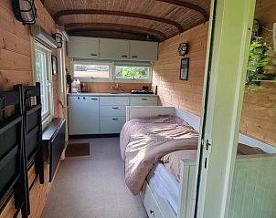 Comfortabele slaapkamer in vakantieaccommodatie in Broek in Waterland.