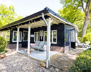 Gezellige veranda van Vakantiehuisje in Nutter, perfect voor ontspanning in Twente, Overijssel.