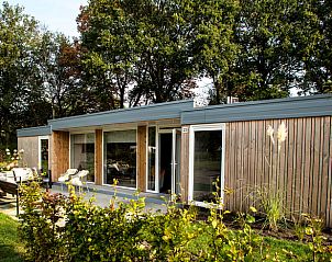 Vacation cottage in Den Ham, Twente, offers a serene outdoor space with terrace and beautiful views of the surrounding countryside in Overijssel.