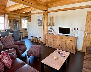 Cozy living room in Holiday cottage in Den Ham, Twente, Overijssel. Wooden interior with comfortable sitting area and country charm.