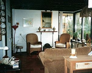 Cozy living room in vacation home at Recreatiepark Noordikhoeve in Reutum, Twente, Overijssel. Relax in comfortable atmosphere.