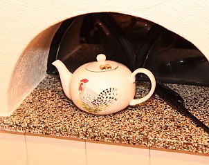 Gezellige theepot in de keuken van Huisje in Hezingen, vakantiehuis in Hezingen, Twente, Overijssel.