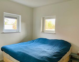 Comfortabele slaapkamer met tweepersoonsbed in Vakantiehuis in Beuningen, Twente, Overijssel.