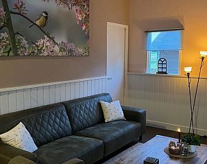 Knusse zithoek in Vakantiehuisje in Overdinkel, perfect voor ontspanning in Twente, Overijssel.