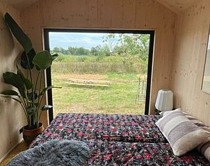 Gezellige slaapkamer in Vakantiehuis in Rijssen, omgeven door het landschap van Twente, Overijssel.