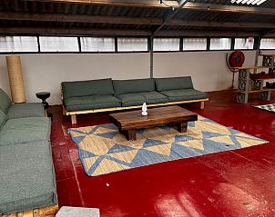 Large indoor area with sofas in Cottage in Rijssen, vacation home in Twente, Overijssel.