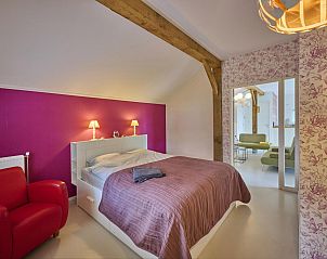 Sfeervolle slaapkamer in Design Farmers Barn Twente, vakantiehuis in Haaksbergen, Twente.