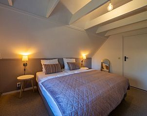 Tweede slaapkamer in Huisje in Haaksbergen, ideaal voor een ontspannen verblijf.