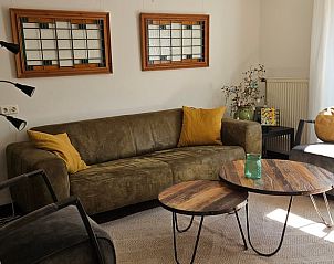 Gezellige woonkamer in Vakantiehuis in Haaksbergen, Twente, Overijssel met comfortabele zitruimte.