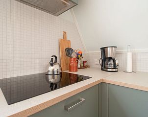 Volledig uitgeruste keuken in Vakantiehuisje in Haaksbergen, perfect voor culinaire avonturen in Twente, Overijssel.