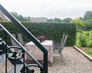 Gezellig buitenterras bij Vakantiehuisje in Haaksbergen, geniet van de frisse lucht in Twente, Overijssel.