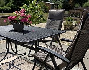 Geniet van de zonnige tuin van Huisje in Diepenheim, een vakantiehuis in het groene Twente, Overijssel.