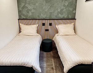 Tweepersoonskamer in Huisje in Enschede, vakantiehuis in Overijssel.