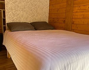 Comfortabele slaapkamer in Vakantiehuis in Enschede, ideaal voor een goede nachtrust in Twente, Overijssel.