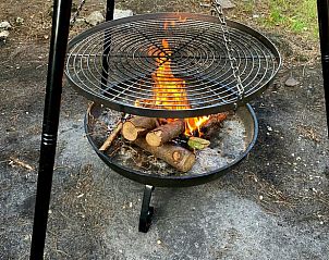 Vuurplaats bij Vakantiehuis in Enschede, perfect voor avonden onder de sterren in Twente, Overijssel.