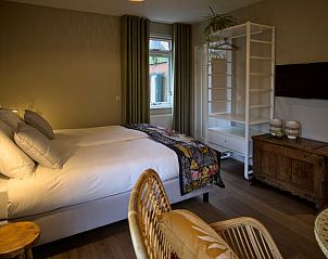 Gezellige slaapkamer in Vakantiehuis in Oldenzaal, Twente, met ruime indeling en rustgevend decor.