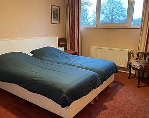 Comfortabele slaapkamer in Huisje in Oldenzaal vakantiehuis in Twente, Overijssel met tweepersoonsbed.