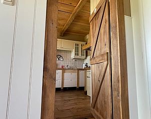 Cozy kitchen in Holiday home in Markelo, Twente, Overijssel, with rustic wooden finish and modern amenities.