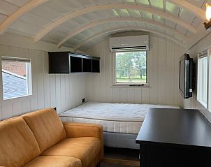 Comfortable bedroom in Holiday cottage in Markelo, Twente, Overijssel with large window for natural light.