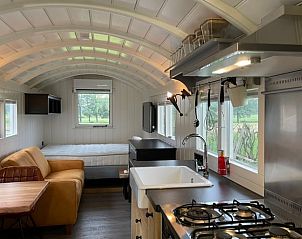 Open kitchen and living room in Holiday home in Markelo, Twente, Overijssel with modern furnishings.