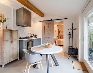 Stylish kitchen in Holiday Home in Usselo, Twente, complete with modern appliances and attractive furnishings.
