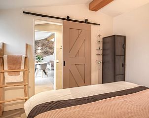 Comfortable bedroom in Holiday Home in Usselo, Twente, with a soothing atmosphere and modern touches.