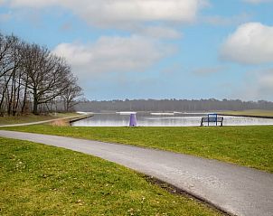 See-through view from bathroom to living room in Holiday home in Usselo, Twente, with modern furnishings.