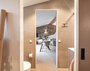 Bathroom and bedroom in Holiday home in Usselo, Twente, with modern and comfortable furnishings.