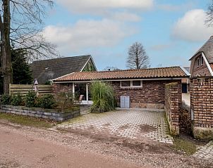 Bathroom in Holiday Home in Usselo, Twente, with stylish decor and access to the bedroom.